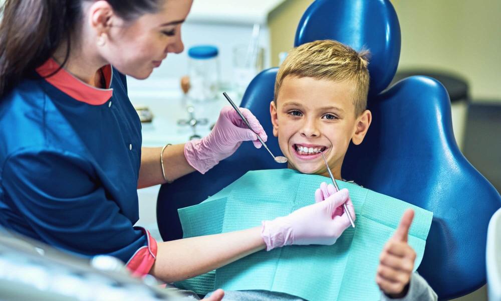 Child in dental seat