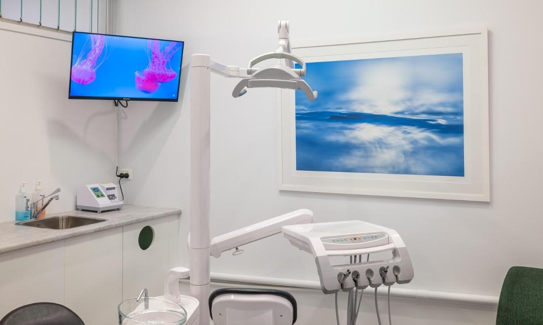 Surgery one at Waterways Dental with beautiful artwork on the wall - Photography by Ted Grambeau